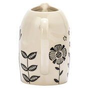 Embossed flower pitcher